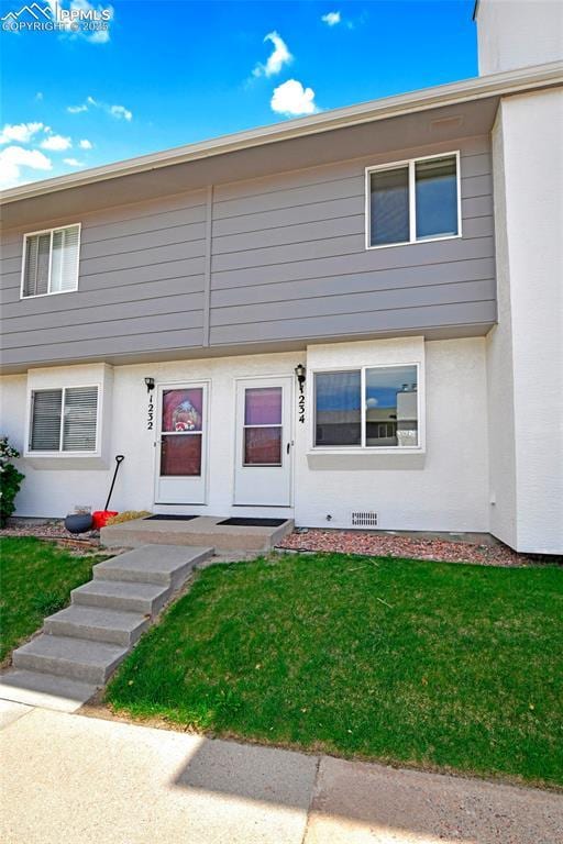 1234 Soaring Eagle Dr, Colorado Springs, CO 80915 - view of front of house featuring a front lawn