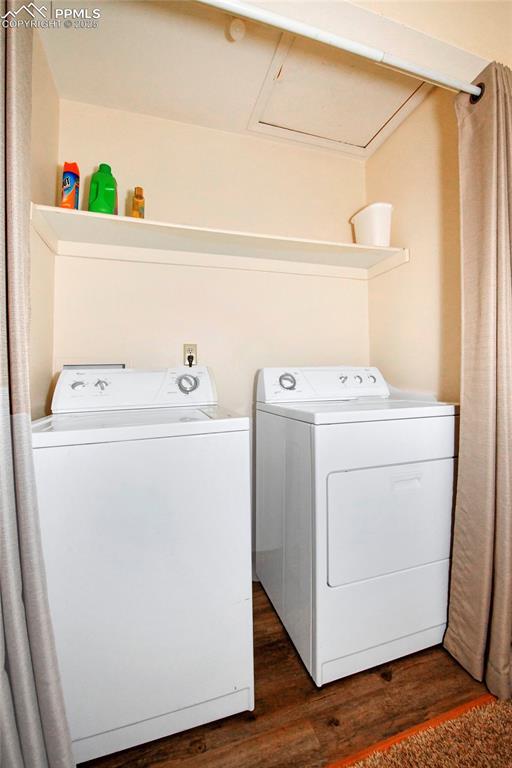 1234 Soaring Eagle Dr, Colorado Springs, CO 80915 - clothes washing area with separate washer and dryer and dark wood-style floors