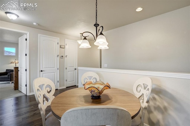 2062 Lone Willow Vw, Colorado Springs, CO 80904 - dining space featuring wood finished floors, baseboards, and recessed lighting