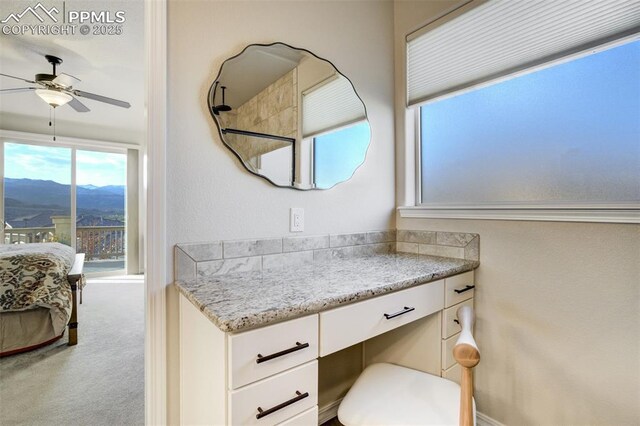 2062 Lone Willow Vw, Colorado Springs, CO 80904 - bathroom featuring a mountain view, ceiling fan, and vanity