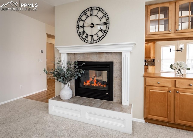 12515 Broad Oaks Dr, Colorado Springs, CO 80921 - detailed view of a fireplace, baseboards, and carpet floors