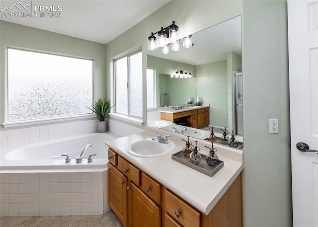12515 Broad Oaks Dr, Colorado Springs, CO 80921 - full bath featuring vanity, a garden tub, and a shower stall