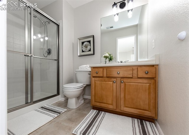 12515 Broad Oaks Dr, Colorado Springs, CO 80921 - bathroom with toilet, a shower stall, vanity, and baseboards