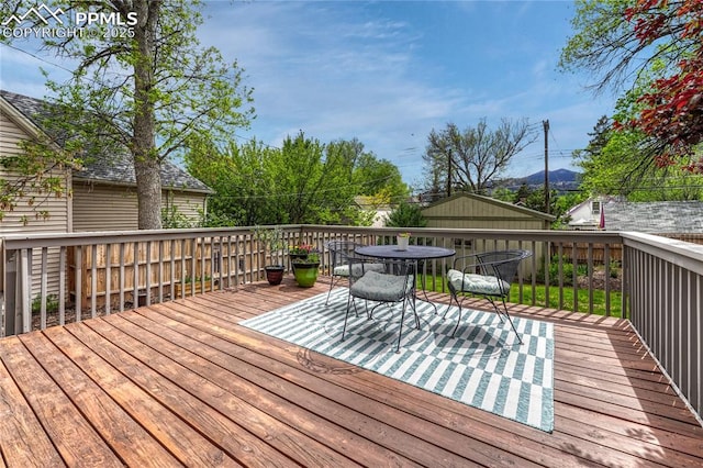 115 N 24th St, Colorado Springs, CO 80904 - wooden terrace with outdoor dining space
