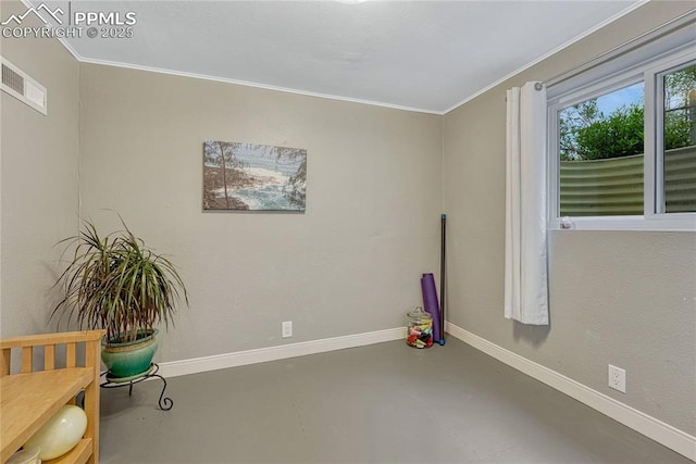 115 N 24th St, Colorado Springs, CO 80904 - interior space featuring finished concrete floors, crown molding, and baseboards