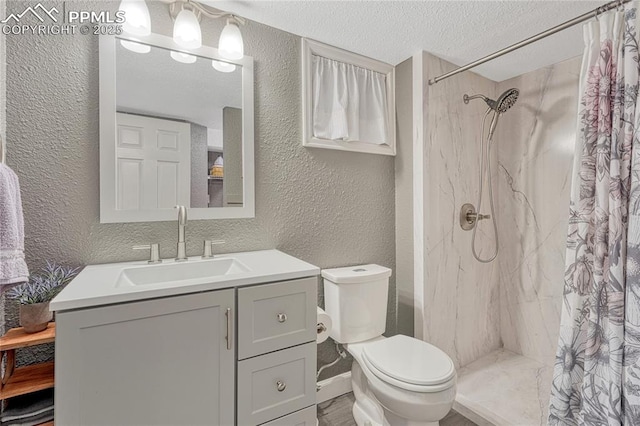 115 N 24th St, Colorado Springs, CO 80904 - bathroom with a textured wall, toilet, vanity, a textured ceiling, and a shower with shower curtain