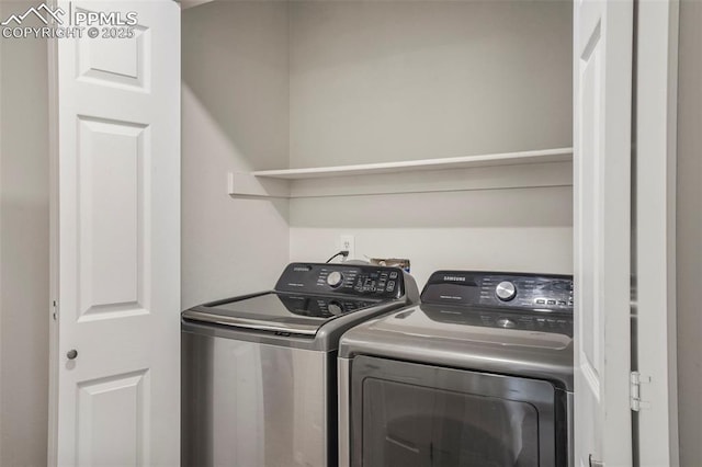 laundry area with separate washer and dryer
