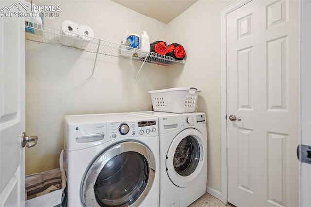 8445 Jacks Fork Dr, Colorado Springs, CO 80924 - laundry room featuring washer and dryer and baseboards