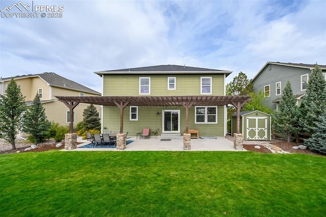8445 Jacks Fork Dr, Colorado Springs, CO 80924 - rear view of property with a pergola, a patio area, and a lawn