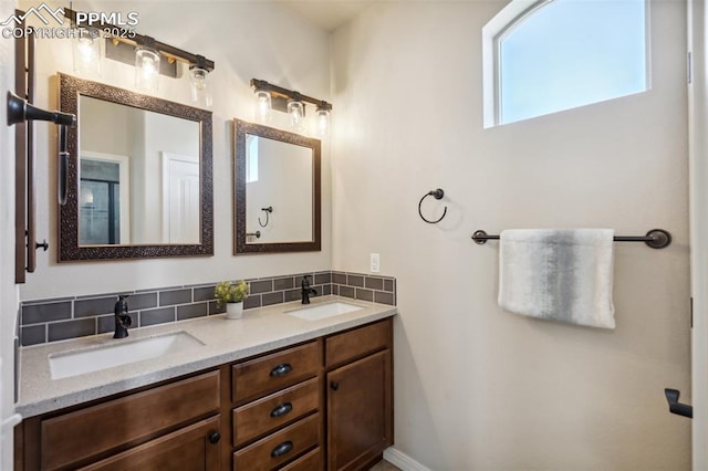 7663 Double Barrel Hts, Colorado Springs, CO 80923 - full bath with tasteful backsplash and double vanity