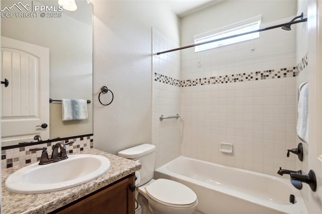 7663 Double Barrel Hts, Colorado Springs, CO 80923 - full bathroom featuring toilet, vanity, bathtub / shower combination, and a textured wall