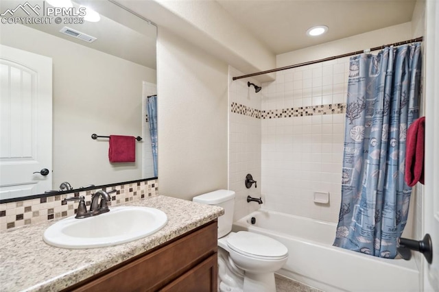 7663 Double Barrel Hts, Colorado Springs, CO 80923 - full bathroom featuring shower / tub combo with curtain, vanity, and toilet