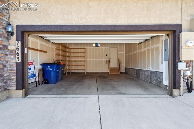 7663 Double Barrel Hts, Colorado Springs, CO 80923 - garage featuring electric panel