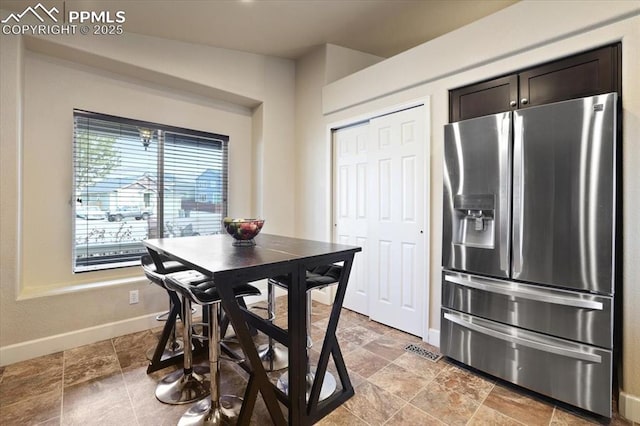 7719 Paca Pl, Fountain, CO 80817 - dining area with baseboards