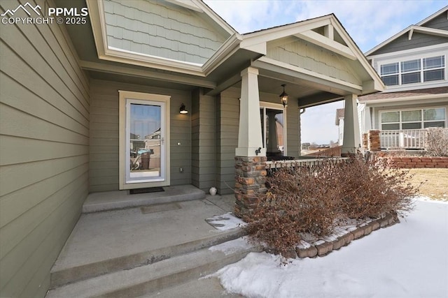 7719 Paca Pl, Fountain, CO 80817 - snow covered property entrance featuring covered porch