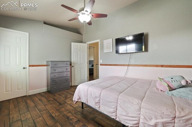 7719 Paca Pl, Fountain, CO 80817 - bedroom featuring wood finished floors, baseboards, vaulted ceiling, and ceiling fan