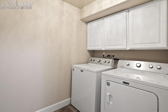 7719 Paca Pl, Fountain, CO 80817 - washroom featuring cabinet space, baseboards, and separate washer and dryer