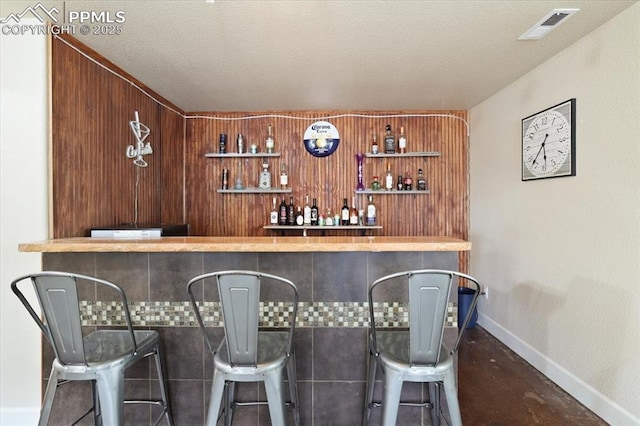 7719 Paca Pl, Fountain, CO 80817 - indoor bar featuring baseboards
