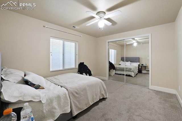 7719 Paca Pl, Fountain, CO 80817 - bedroom featuring carpet flooring, baseboards, and multiple windows