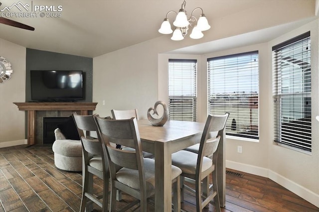 7719 Paca Pl, Fountain, CO 80817 - dining area featuring healthy amount of natural light, baseboards, and dark wood-type flooring