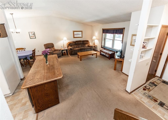 15335 Deby Dr, Colorado Springs, CO 80921 - living room with vaulted ceiling, a chandelier, and light colored carpet