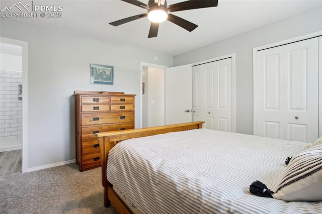 8360 Boxelder Dr, Colorado Springs, CO 80920 - bedroom featuring two closets, baseboards, and ceiling fan