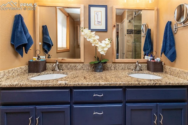 1053 Kings Crown Rd, Woodland Park, CO 80863 - bathroom with double vanity, a stall shower, and a textured wall