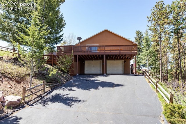 1053 Kings Crown Rd, Woodland Park, CO 80863 - garage with driveway