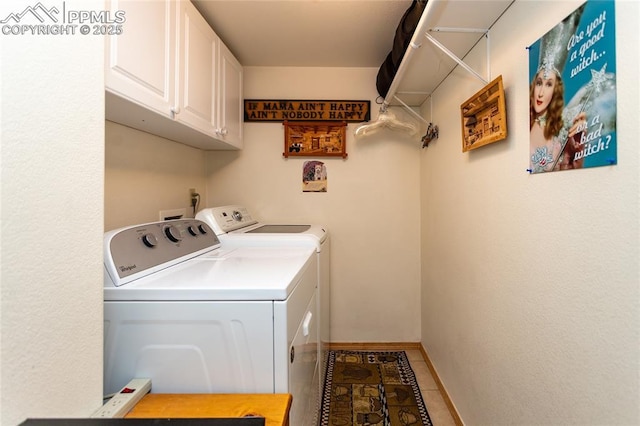 1053 Kings Crown Rd, Woodland Park, CO 80863 - laundry room featuring cabinet space, washer and clothes dryer, and baseboards