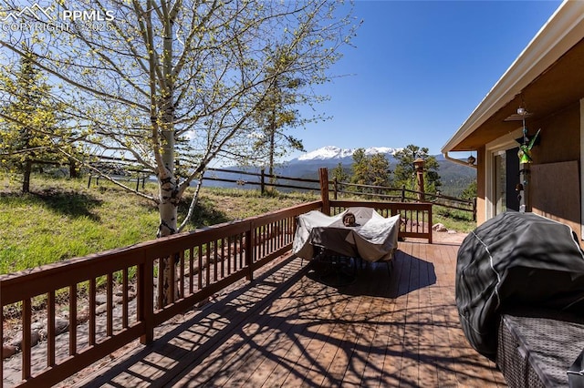 1053 Kings Crown Rd, Woodland Park, CO 80863 - wooden deck with a mountain view
