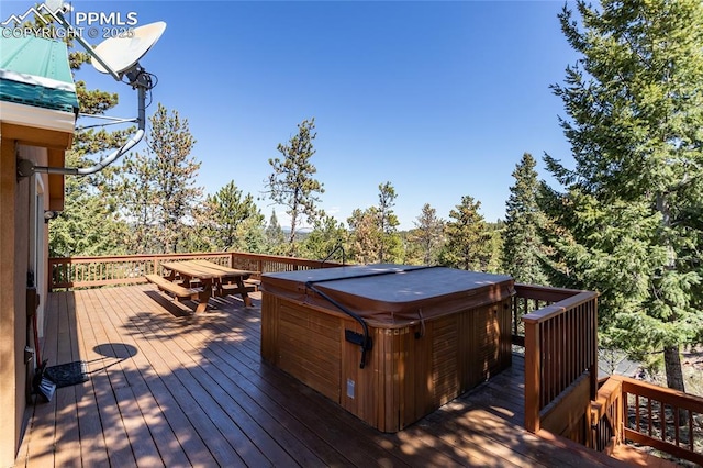 1053 Kings Crown Rd, Woodland Park, CO 80863 - wooden deck with a hot tub