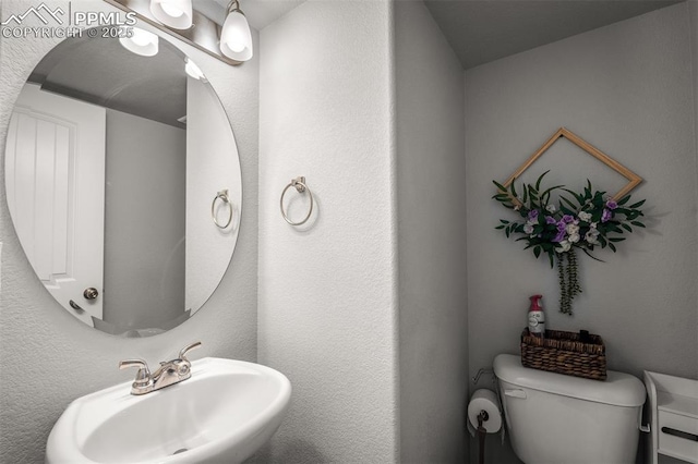 7568 Benecia Dr, Fountain, CO 80817 - bathroom featuring a sink and toilet