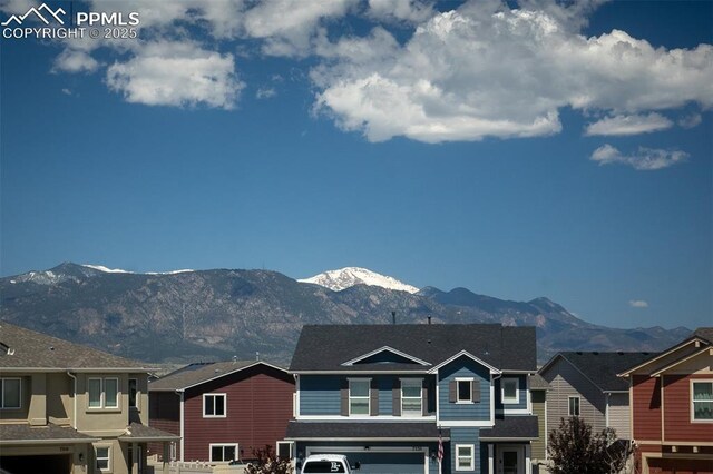 7568 Benecia Dr, Fountain, CO 80817 - mountain view with nearby suburban area