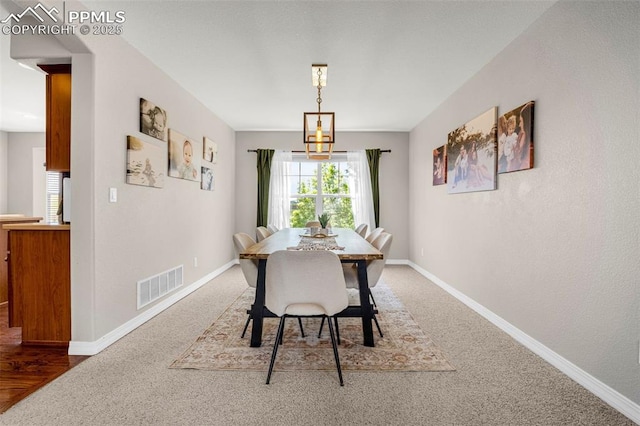 9883 Red Sage Dr, Colorado Springs, CO 80920 - carpeted dining area featuring plenty of natural light and baseboards