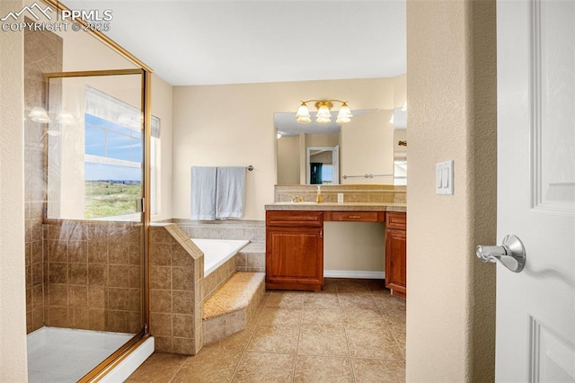9883 Red Sage Dr, Colorado Springs, CO 80920 - full bath with vanity, a bath, a stall shower, tile patterned flooring, and a chandelier
