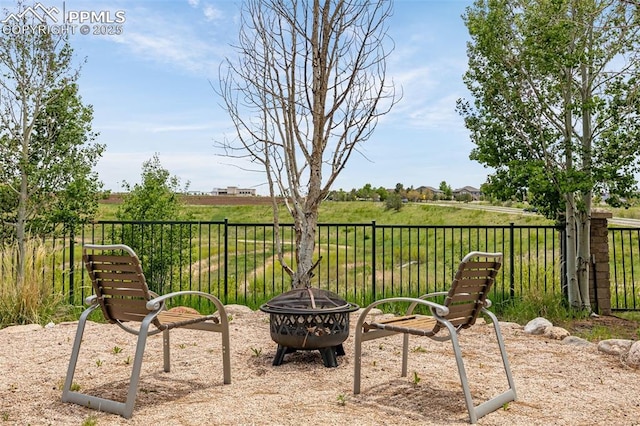 9883 Red Sage Dr, Colorado Springs, CO 80920 - view of yard with an outdoor fire pit