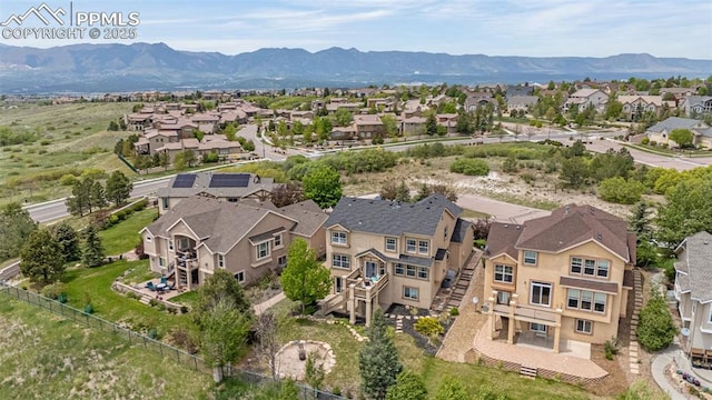 9883 Red Sage Dr, Colorado Springs, CO 80920 - aerial perspective of suburban area featuring mountains