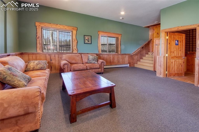 65 Sunshine Loop, Fairplay, CO 80440 - carpeted living room with a baseboard radiator, wood walls, wainscoting, stairway, and recessed lighting