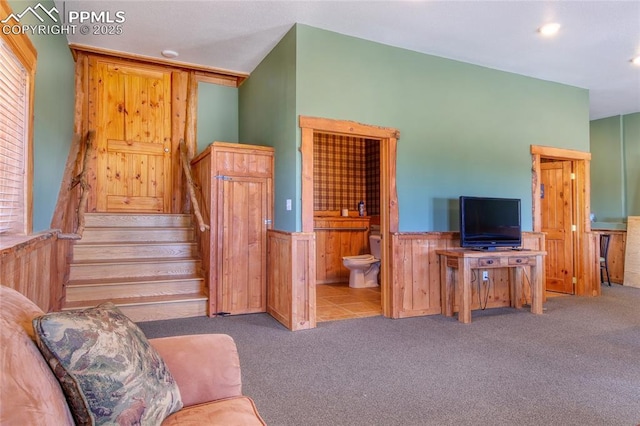 65 Sunshine Loop, Fairplay, CO 80440 - living area with carpet floors, a wainscoted wall, stairs, and recessed lighting