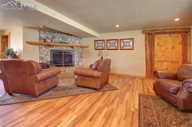 65 Sunshine Loop, Fairplay, CO 80440 - living area with wood finished floors, a fireplace, baseboards, and recessed lighting