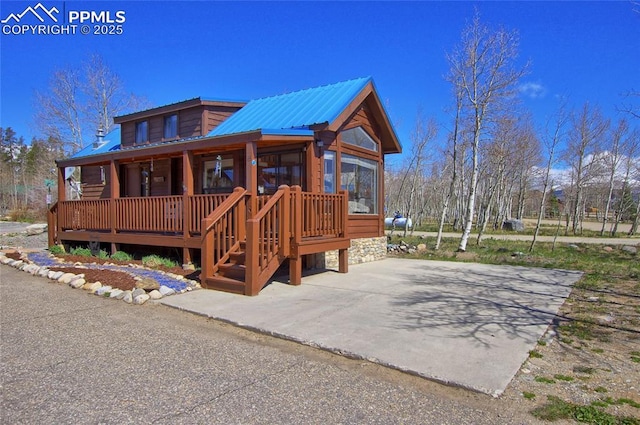 65 Sunshine Loop, Fairplay, CO 80440 - view of front of home featuring a porch and metal roof