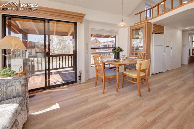 65 Sunshine Loop, Fairplay, CO 80440 - dining space featuring light wood finished floors, plenty of natural light, and lofted ceiling