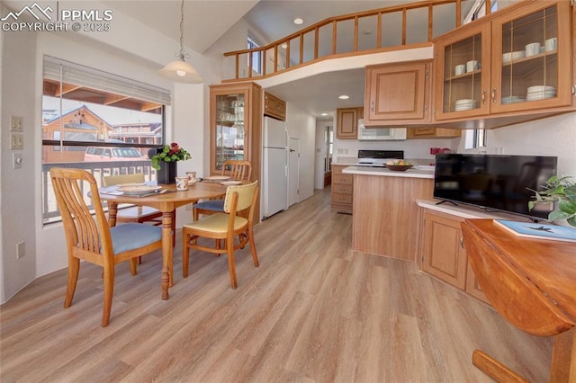 65 Sunshine Loop, Fairplay, CO 80440 - dining room featuring light wood finished floors and high vaulted ceiling