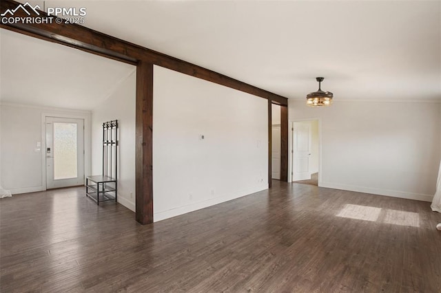 527 Golden Grain Ln, Divide, CO 80814 - unfurnished room featuring wood finished floors, baseboards, a chandelier, and lofted ceiling