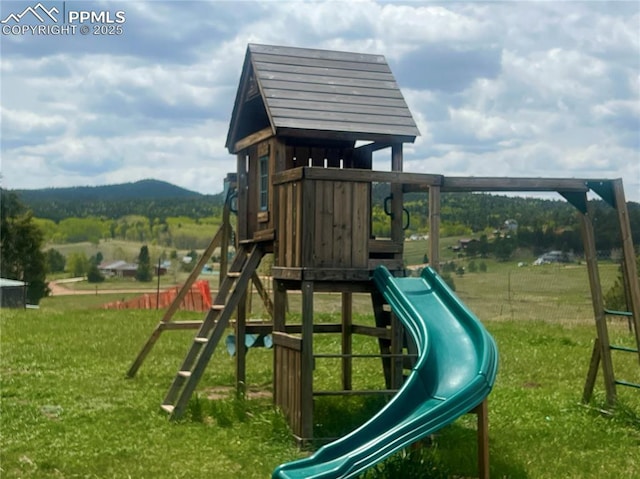 527 Golden Grain Ln, Divide, CO 80814 - view of play area with a lawn