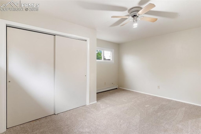 15 W Brookside St, Colorado Springs, CO 80905 - unfurnished bedroom featuring a baseboard radiator, carpet flooring, a closet, and baseboards