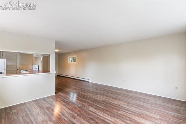 15 W Brookside St, Colorado Springs, CO 80905 - unfurnished living room featuring a baseboard radiator and wood finished floors