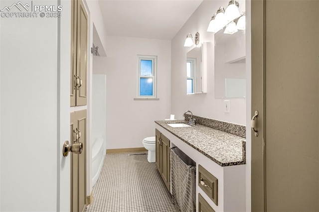 1604 E Kiowa St, Colorado Springs, CO 80909 - full bathroom featuring toilet and vanity