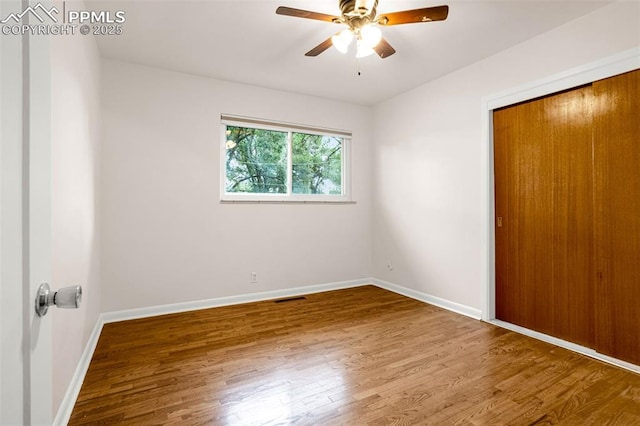 1604 E Kiowa St, Colorado Springs, CO 80909 - unfurnished bedroom with wood finished floors and ceiling fan