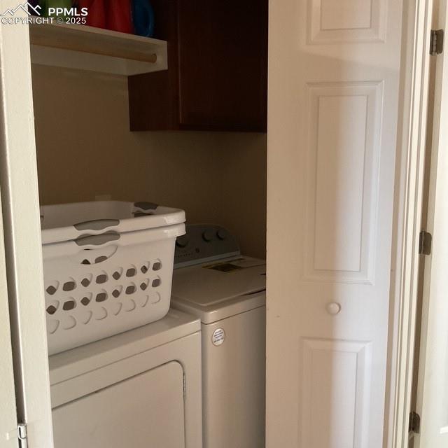 71 Mt Elbert Dr, Florissant, CO 80816 - laundry room with separate washer and dryer and cabinet space